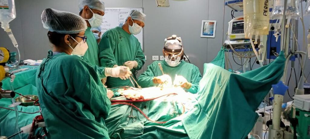 Dr Lalit Malik Performing Heart Surgery